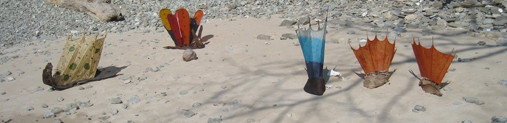 In sleepy Cabuya, on the beach at the southern 
	end of Costa Rica's Nicoya Peninsula, Swiss artist Claudia Bassauer creates tropical 
	lighting using natural materials such as driftwood, leaves, bamboo, shells, and handmade 
	papers.  Claudia Bassauer tropical lamps are available in many shapes, sizes, and colors.  
	Claudia Bassauer's lamps are inspired by the jungles, rainforests, and beaches surrounding 
	her studio in Cabuya, Costa Rica, between the small town of Montezuma, Costa Rica and the 
	Cabo Blanco National Park.